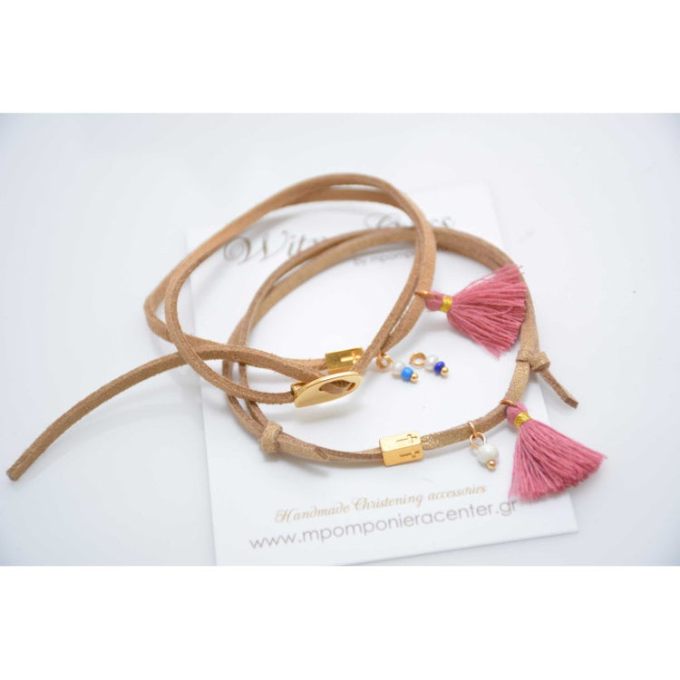 Μαρτυρικό βραχιόλι με ιδιαίτερο σουέντ κορδόνι , περαστό σταυρό και κούμπωμα, φουντίτσα και πέρλα