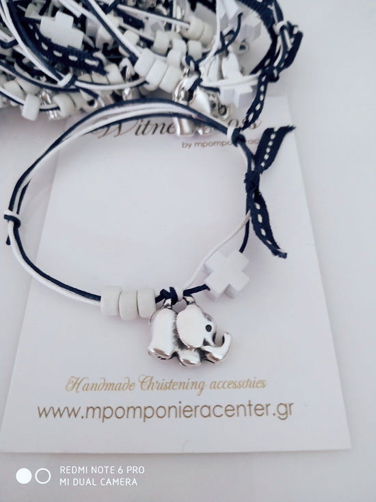 Μαρτυρικό βραχιόλι με διπλό κορδόνι , ξύλινο σταυρό και μεταλλικό ελεφαντάκι 
