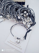 Μαρτυρικό βραχιόλι με διπλό κορδόνι , ξύλινο σταυρό και μεταλλικό ελεφαντάκι 