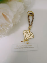 Μαρτυρικό διαμάντι plexiglass μπρελόκ χρυσή με κορδόνι μπέζ και ιδιαίτερο σταυρό σφαίρα