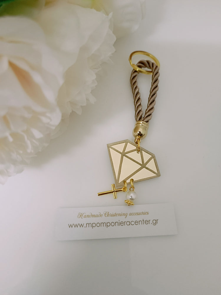 Μαρτυρικό διαμάντι plexiglass μπρελόκ χρυσή με κορδόνι μπέζ και ιδιαίτερο σταυρό σφαίρα