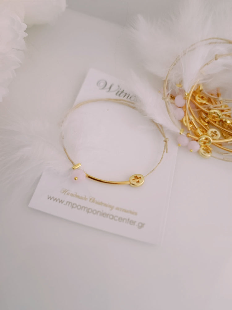Μαρτυρικό βραχιόλι με ιδιαίτερο σταυρό , πούπουλο, κρεμαστή μπίλια ροζ,  περαστό σταυρό σε χρυσό