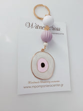 Μαρτυρικό μπρελόκ με μάτι & ιδιαίτερο σταυρό εσωτερικά του μπρελόκ - χάντρες λιλά λευκό