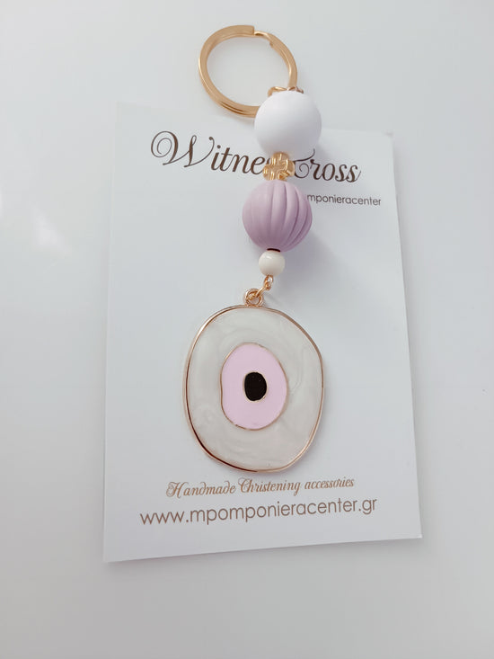 Μαρτυρικό μπρελόκ με μάτι & ιδιαίτερο σταυρό εσωτερικά του μπρελόκ - χάντρες λιλά λευκό