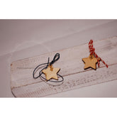 Μαρτυρικό αστεράκι με χρυσό σταυρό  και παραμάνα πίσω (για το μπέτι)