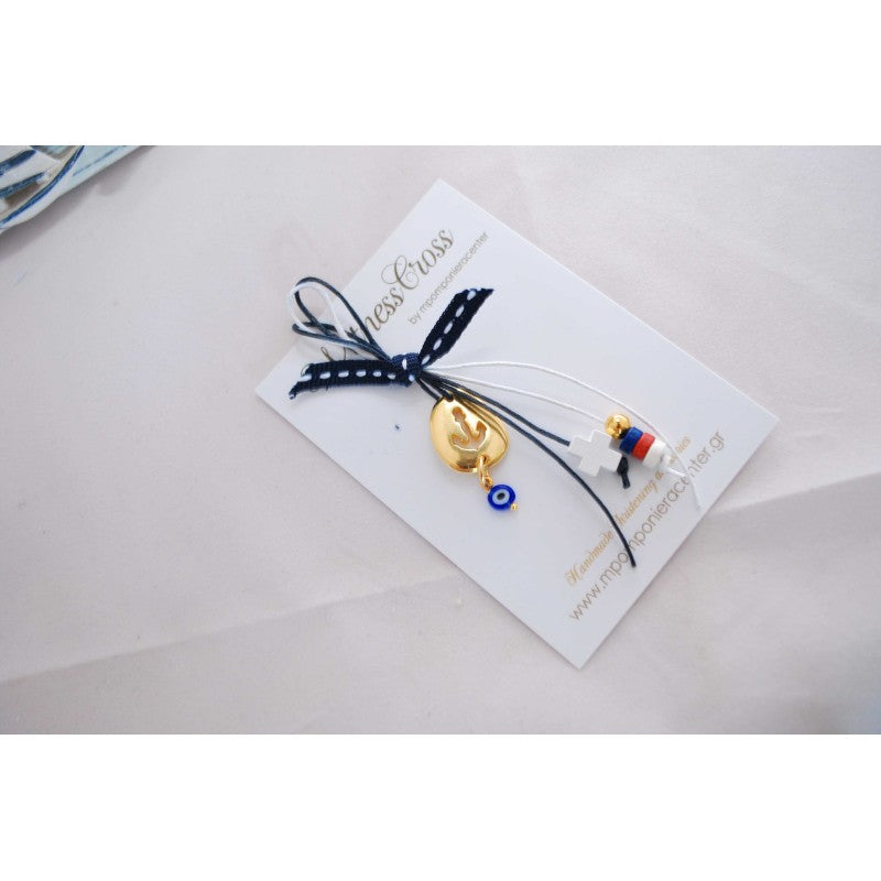 Μαρτυρικό για το μπέτι με εντυπωσιακή άγκυρα , σταυρό και χαντρούλες