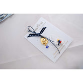 Μαρτυρικό για το μπέτι με εντυπωσιακή άγκυρα , σταυρό και χαντρούλες