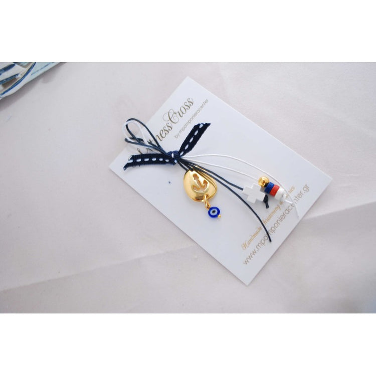 Μαρτυρικό για το μπέτι με εντυπωσιακή άγκυρα , σταυρό και χαντρούλες