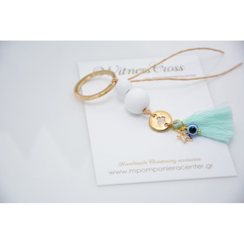 Μαρτυρικό μπρελόκ με αστεράκι και ματάκι στο πλάι , ιδιαίτερο σταυρό & φούντα βεραμάν
