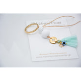 Μαρτυρικό μπρελόκ με αστεράκι και ματάκι στο πλάι , ιδιαίτερο σταυρό & φούντα βεραμάν
