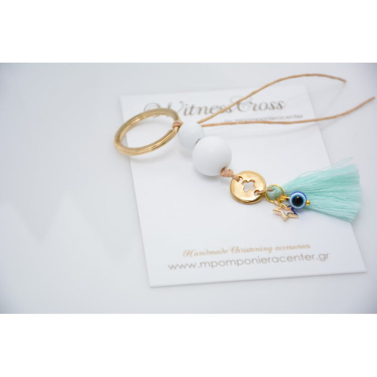 Μαρτυρικό μπρελόκ με αστεράκι και ματάκι στο πλάι , ιδιαίτερο σταυρό & φούντα βεραμάν
