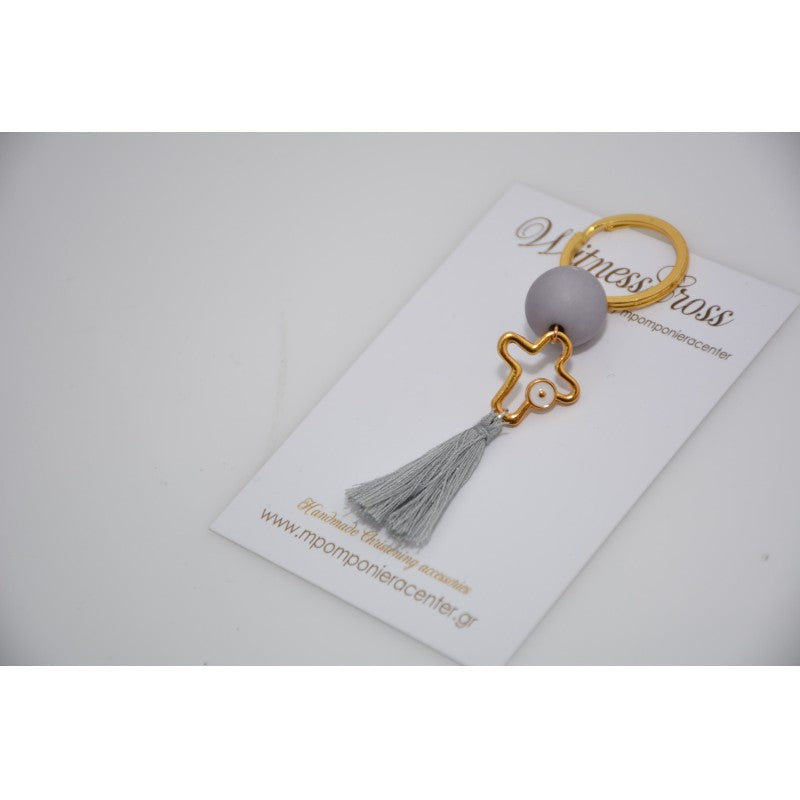 Μαρτυρικό μπρελόκ με ιδιαίτερο σταυρό και φούντα σε γκρι αποχρώσεις