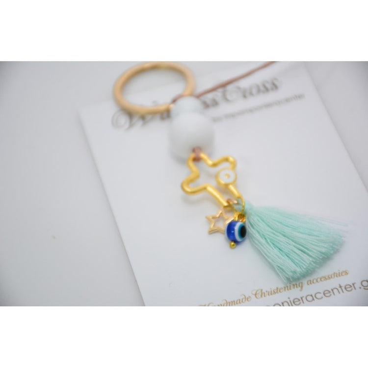 Μαρτυρικό μπρελόκ με αστεράκι και ματάκι στο πλάι , ιδιαίτερο σταυρό & φούντα βεραμάν

