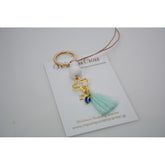 Μαρτυρικό μπρελόκ με αστεράκι και ματάκι στο πλάι , ιδιαίτερο σταυρό & φούντα βεραμάν
