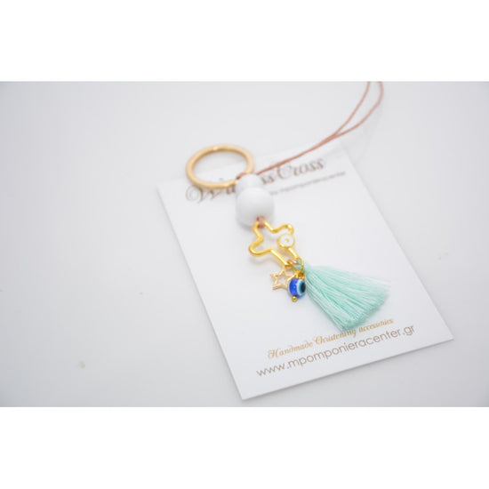 Μαρτυρικό μπρελόκ με αστεράκι και ματάκι στο πλάι , ιδιαίτερο σταυρό & φούντα βεραμάν
