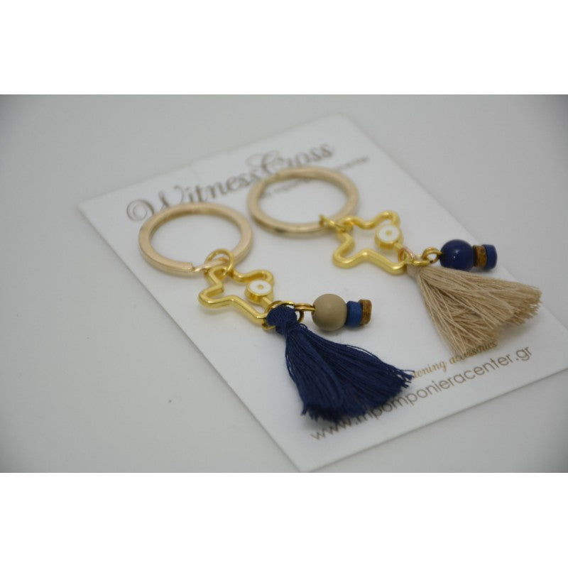 Μαρτυρικό μπρελόκ με ματάκι στο πλάι , ιδιαίτερο σταυρό & φούντα μπλέ σκούρα (navy) ή μπέζ