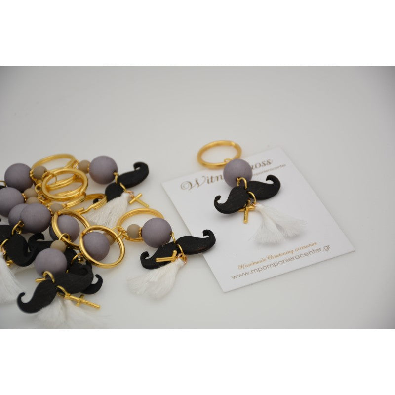 Μαρτυρικό μπρελόκ μουστάκι σε γκρι μαύρες αποχρώσεις , με φουντίτσα λευκή