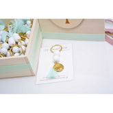 Μαρτυρικό μπρελόκ Κωνσταντινάτο με χάντρες λευκές και φούντα βεραμάν
