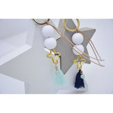 Μαρτυρικό μπρελόκ με ματάκι στο πλάι , ιδιαίτερο σταυρό & φούντα βεραμάν