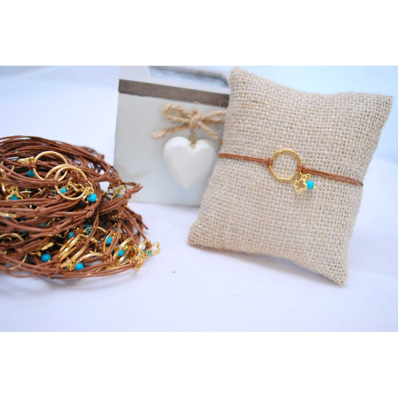 Μαρτυρικό με κύκλο μεταλλικό , σταυρό και ματάκι στο πλάι και ημιπολύτιμο πέτρωμα τυρκουάζ χαντρούλα