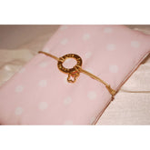 Μαρτυρικό με κύκλο ζωής μεταλλικό , σταυρό και ματάκι (laugh, live, love)