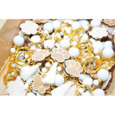 Μαρτυρικό βραχιόλι πατουσίτσα σκύλου σε αποχρώσεις μπέζ με χρυσό σταυρό