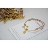 Μαρτυρικό με ιδιαίτερο μεταλλικό σταυρό ματάκι στο πλάι με κρεμαστή χελωνίτσα