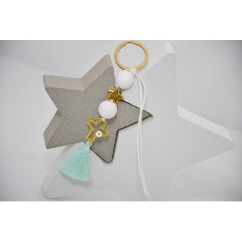 Μαρτυρικό μπρελόκ με αστέρι & ιδιαίτερο σταυρό μάτι με λευκές χάντρες & βεραμάν φούντα
