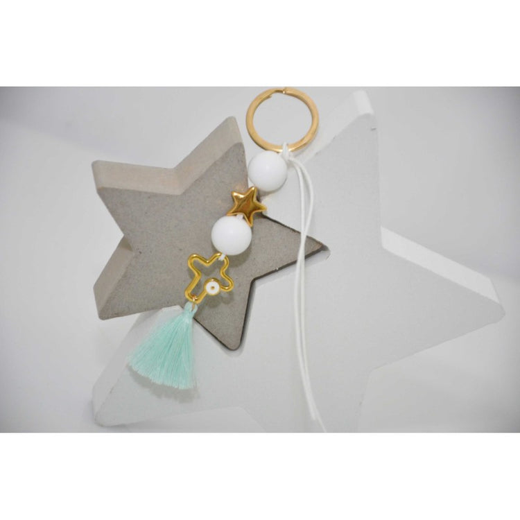 Μαρτυρικό μπρελόκ με αστέρι & ιδιαίτερο σταυρό μάτι με λευκές χάντρες & βεραμάν φούντα