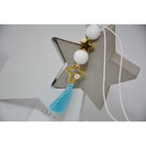 Μαρτυρικό μπρελόκ με αστέρι & ιδιαίτερο σταυρό μάτι με λευκές χάντρες & βεραμάν φούντα