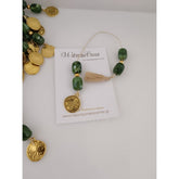 Μαρτυρικό μπεγλέρι ΑγιοΚωνσταντινάτο με χάντρες σε πράσινο ζούγκλας