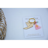 Μαρτυρικό περιστέρι origami Plexiglass σε χρυσό με φούντα, σταυρό και χάντρες κεραμικές