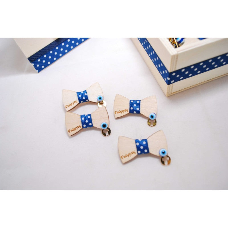 Μαρτυρικό παπιγιόν για το μπέτι με χρώμα της επιλογής σας με σταυρό χρυσό και ματάκι. 