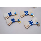 Μαρτυρικό παπιγιόν για το μπέτι με χρώμα της επιλογής σας με σταυρό χρυσό και ματάκι. 