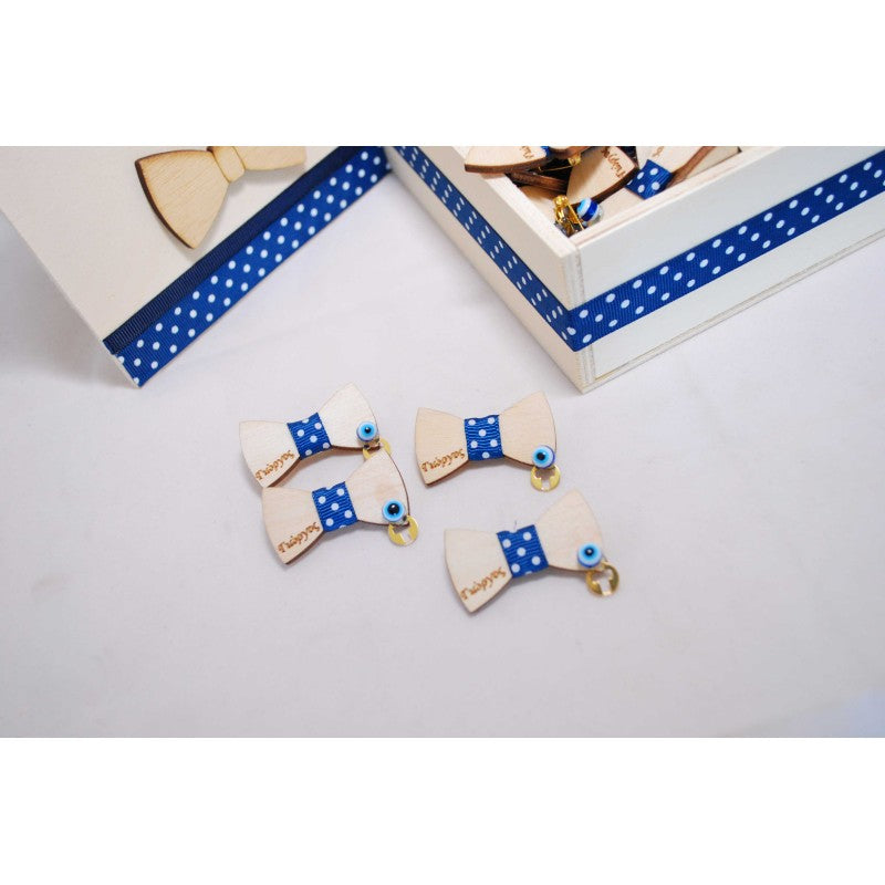 Μαρτυρικό παπιγιόν για το μπέτι με χρώμα της επιλογής σας με σταυρό χρυσό και ματάκι. 