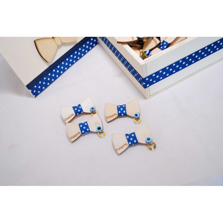 Μαρτυρικό παπιγιόν για το μπέτι με χρώμα της επιλογής σας με σταυρό χρυσό και ματάκι. 