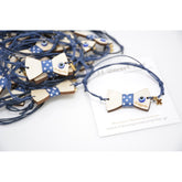 Μαρτυρικό παπιγιόν βραχιόλι ξύλινο με ματάκι και χάραξη το όνομα του παιδιού