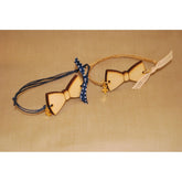 Μαρτυρικό παπιγιόν βραχιόλι ξύλινο & μεταλλικό σταυρό