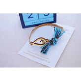 Μαρτυρικό βραχιόλι με ξύλινο σταυρό και πέρλες - τυρκουάζ αποχρώσεις