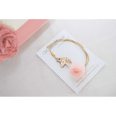 Μαρτυρικό βραχιόλι με μονόκερο ξύλινο , πον-πον τούλινο & σταυρό χάντρα