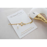 Μαρτυρικό βραχιόλι με ένα ιδιαίτερο σταυρό με μάτι εσωτερικά (σμάλτου) και πέρλα κρεμαστή σταγόνα