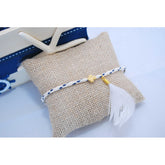 Μαρτυρικό βραχιόλι indian με ιδιαίτερο σταυρό και φτερό κρεμαστό