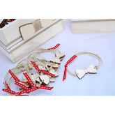 Μαρτυρικό βραχιόλι παπιγιόν με μπεζ και κόκκινη κορδέλα