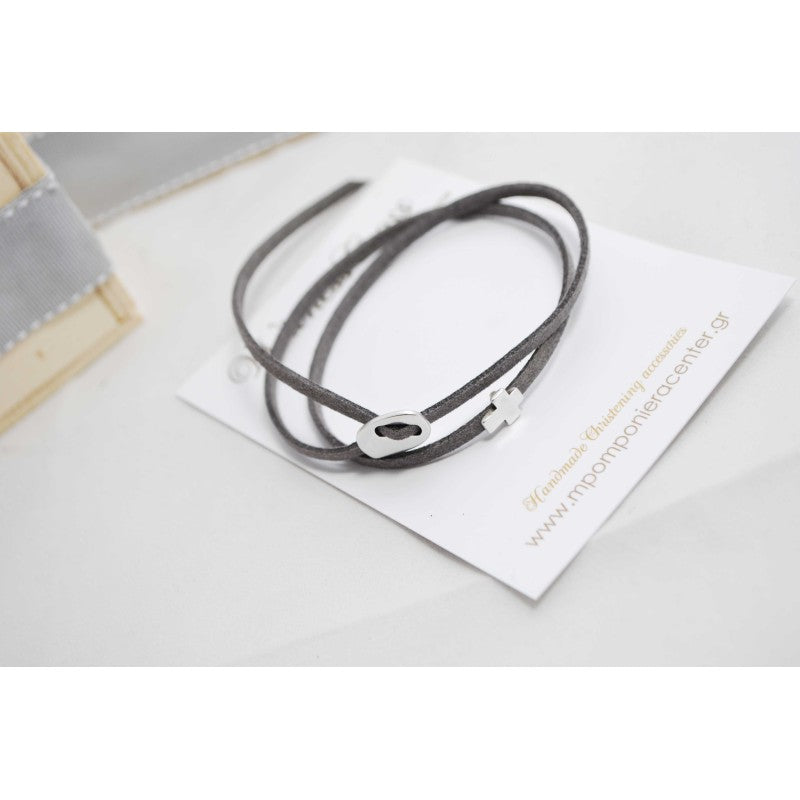 Μαρτυρικό βραχιόλι με ιδιαίτερο σουέτ κορδόνι , περαστό σταυρό και κούμπωμα σε ασημί