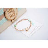 Μαρτυρικό βραχιόλι με σταυρό ξύλινο σε φυσικές αποχρώσεις και βεραμάν