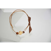 Μαρτυρικό βραχιόλι μπεζ  με ξύλινο σταυρό & χάντρες σε καφέ -μπεζ