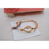 Μαρτυρικό βραχιόλι με ξύλινο σταυρό και πέρλες , ρομαντικό ύφος