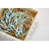 Μαρτυρικό βραχιόλι με κρητική λύρα σε σιέλ-μπεζ αποχρώσεις