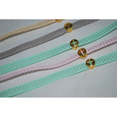 Μαρτυρικό βραχιόλι σε βεραμάν, γκρι, ροζ ή μπεζ με ιδιαίτερο περαστό σταυρό σε χρυσό