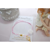 Μαρτυρικό βραχιόλι με γλειφιτζούρι σε ροζ παλ αποχρώσεις